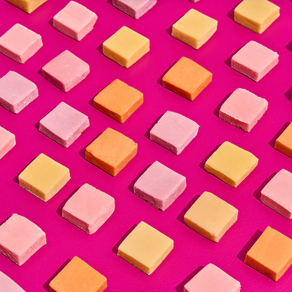 classic_fruit_protein_candy_on_pink_background
